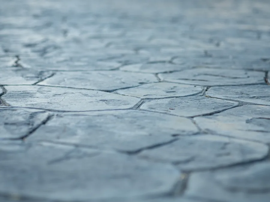 Stamped concrete in a grey flagstone pattern